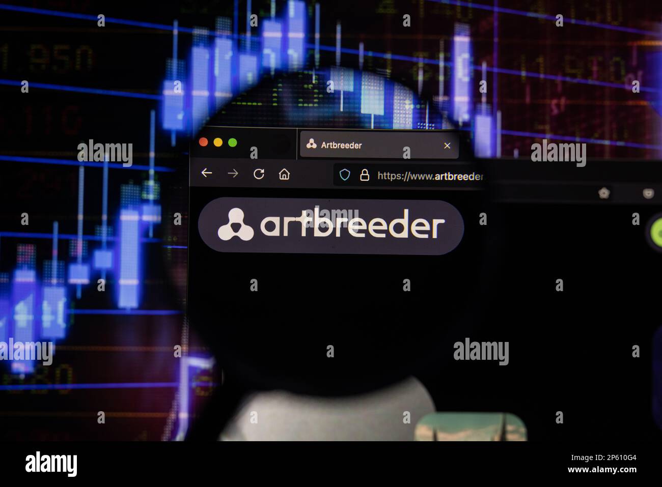 Artbreeder ai company logo on a website with blurry stock market developments in the background, seen on a computer screen through a magnifying glass Stock Photo
