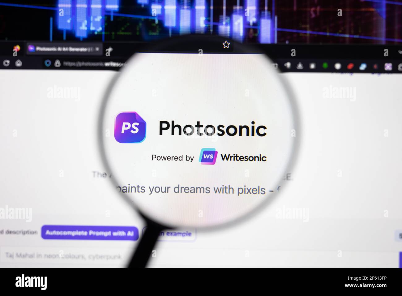 Photosonic company logo on a website with blurry stock market developments in the background, seen on a computer screen through a magnifying glass Stock Photo