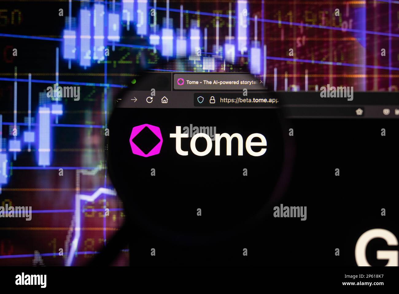 Tome company logo on a website with blurry stock market developments in the background, seen on a computer screen through a magnifying glass Stock Photo