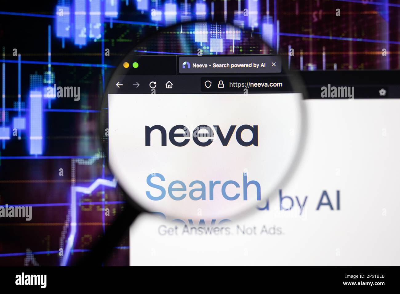Neeva chatbot company logo on a website with blurry stock market developments in the background, seen on a computer screen through a magnifying glass Stock Photo