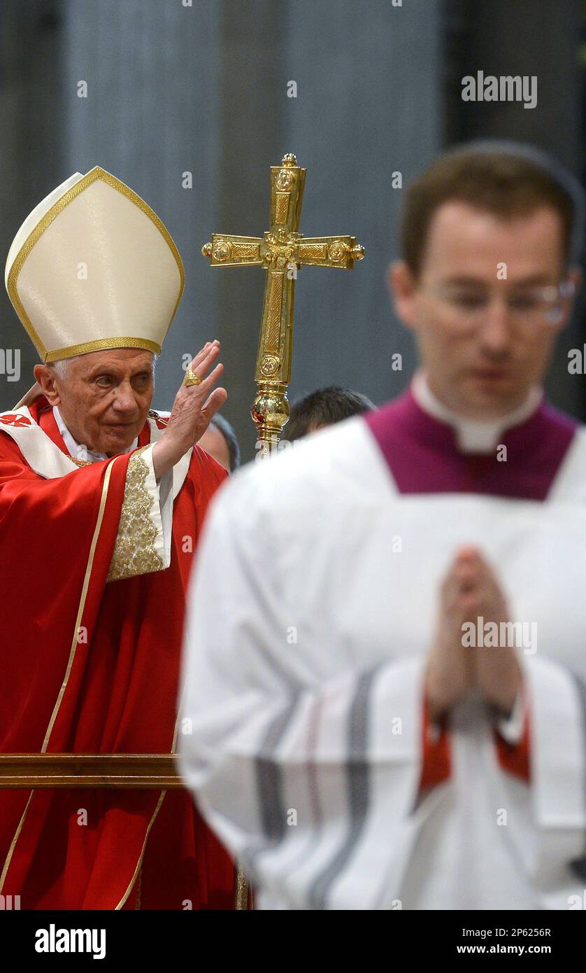 Pope Benedict XVI delivers his blessing as he arrives to celebrate a ...