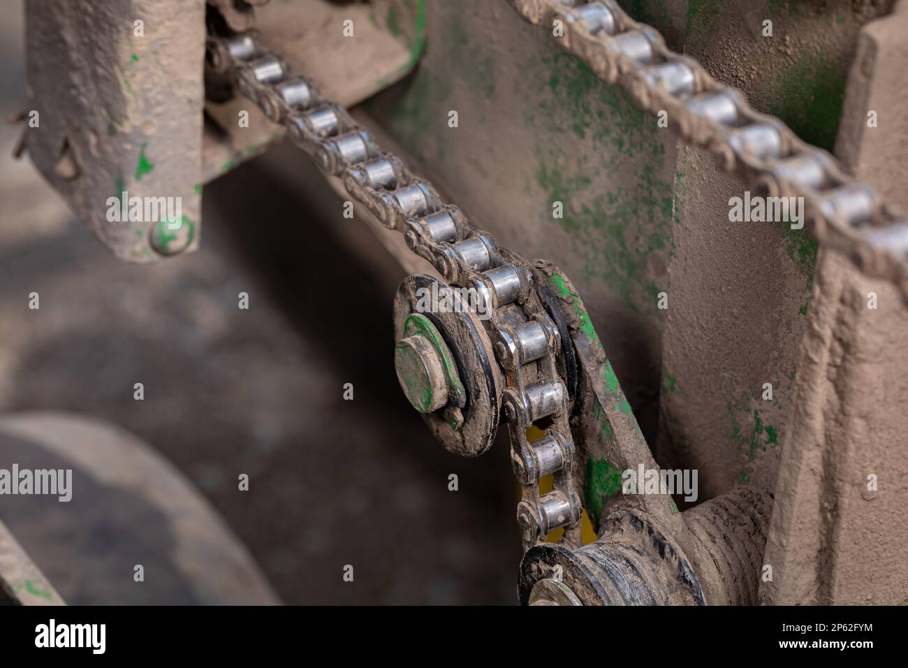 Farm planter chain and gear sprocket. Farming equipment maintenance