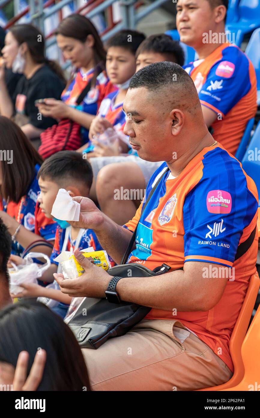 Spectators in the stands at Thai Premier League match, PAT Stadium, Bangkok, Thailand Stock Photo