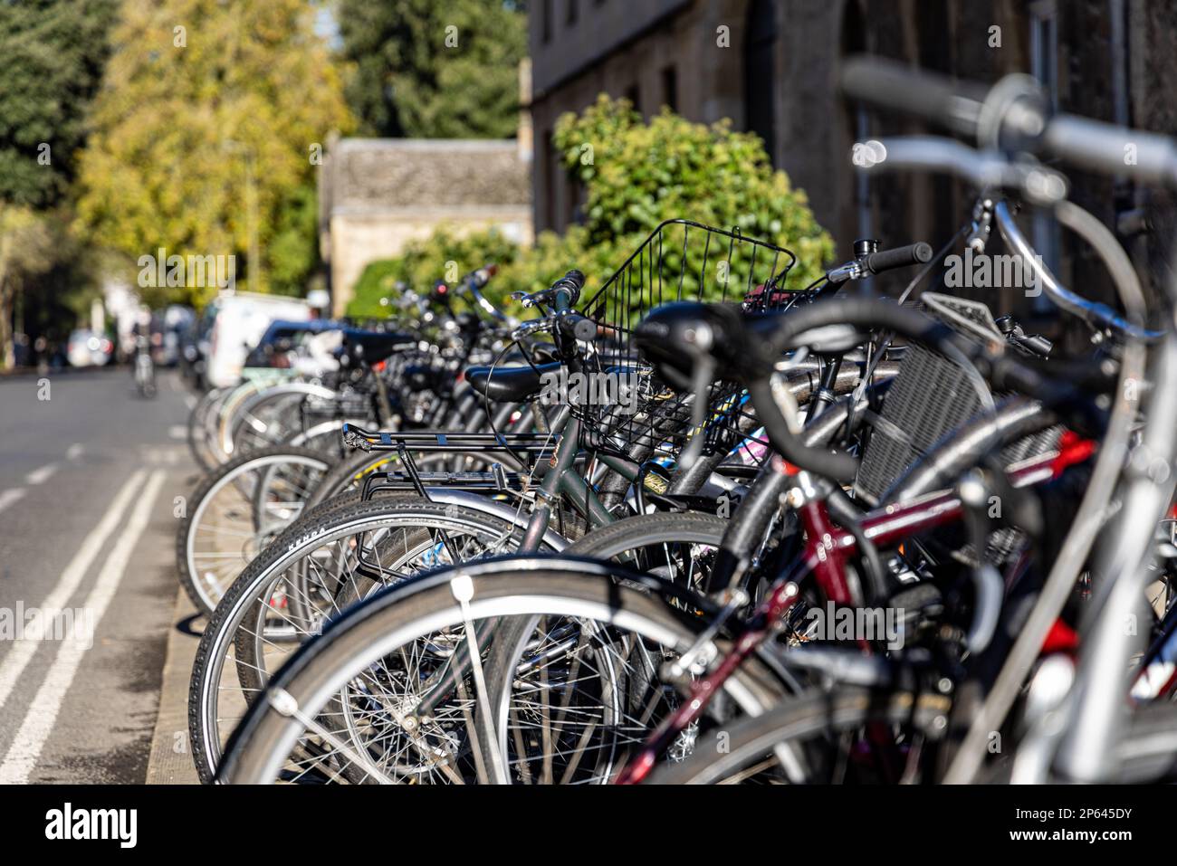 Bicycles chained to railings, Oxford City, Oxford, Oxfordshire, England Stock Photo