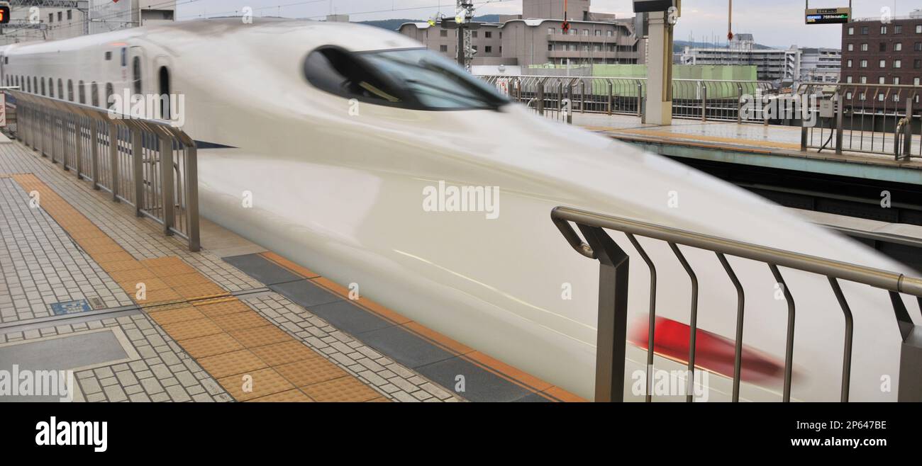 Shinkansen train entering in Kyoto railway station, Japan Stock Photo