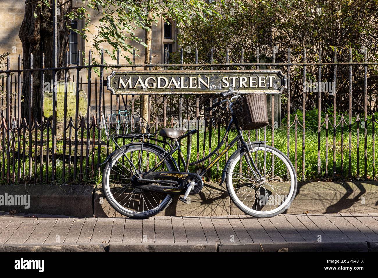 Bicycles chained to railings, Oxford City, Oxford, Oxfordshire, England Stock Photo