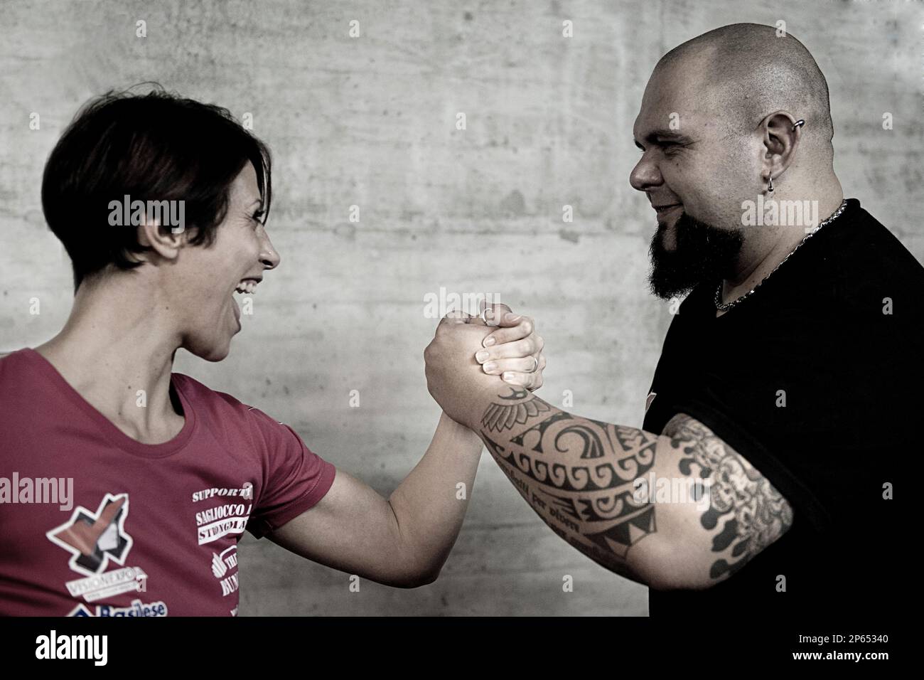 Switzerland, Canton Ticino, Bedano, Paolo Sagliocco Strongman with your girlfriend Stock Photo
