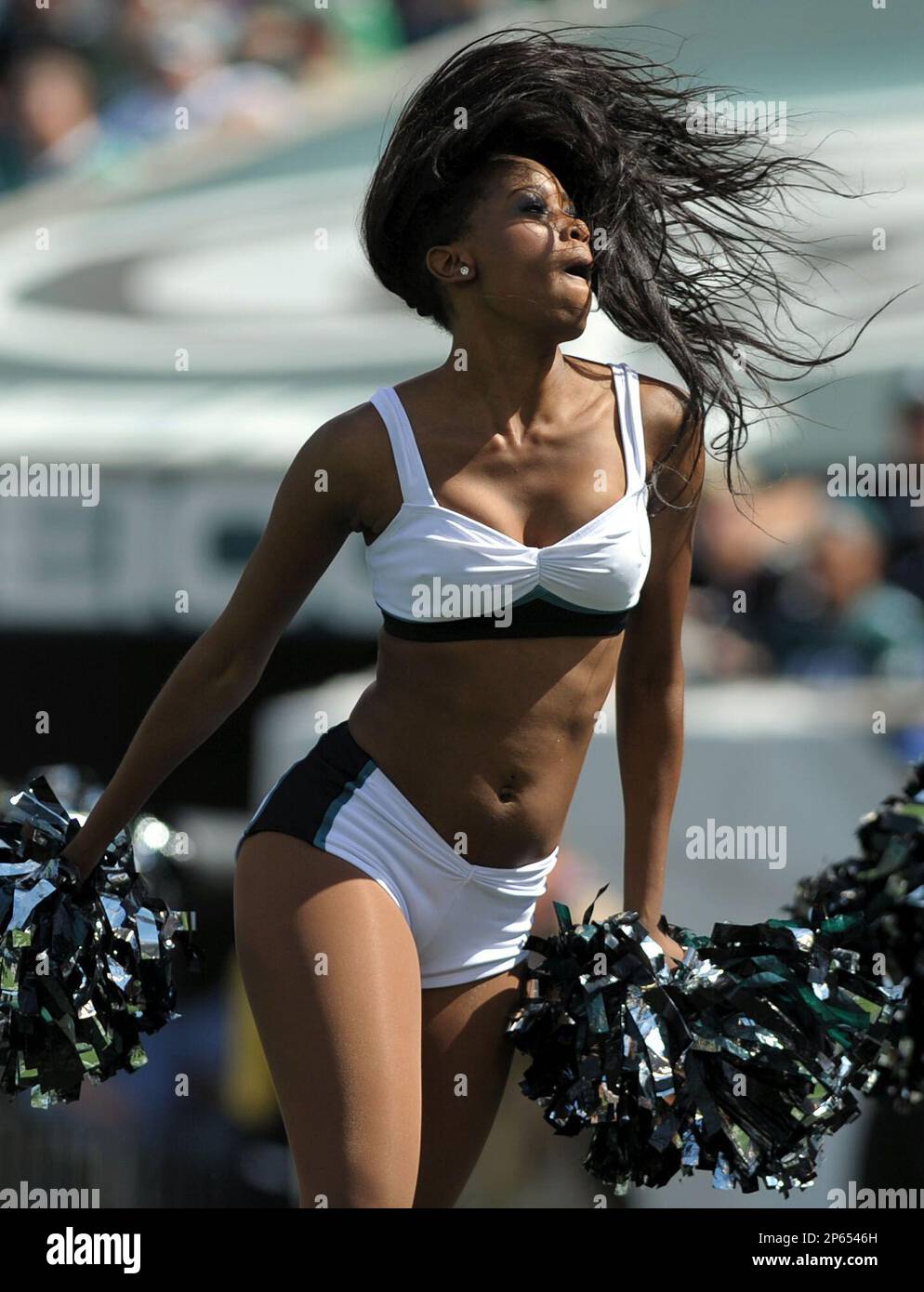 An Eagles cheerleader performs on the field, on September 16th