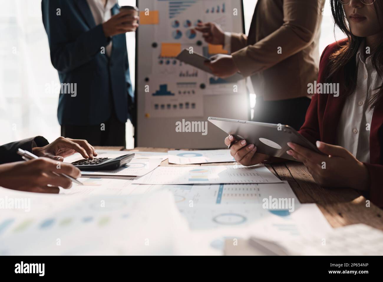Business people financial discuss and analysis plan of market strategy ...