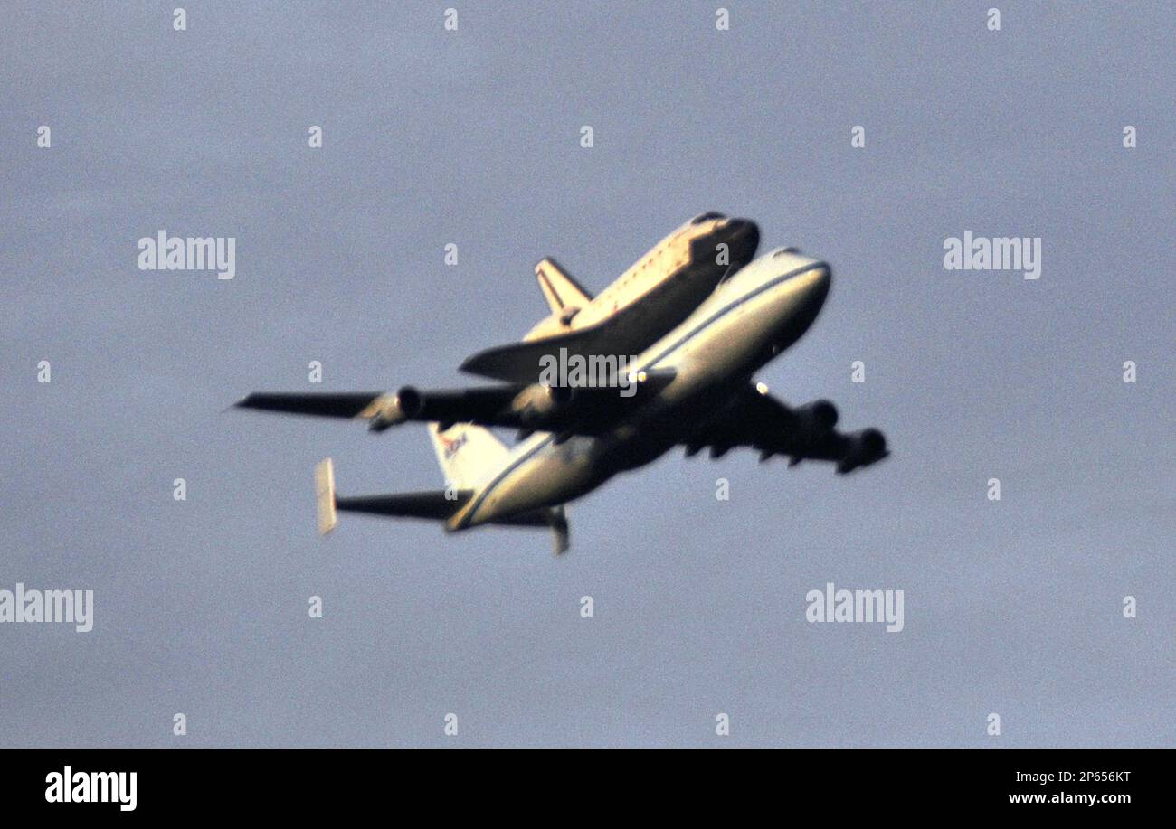 The Space Shuttle Endeavour, carried atop NASA's 747 Shuttle Carrier ...