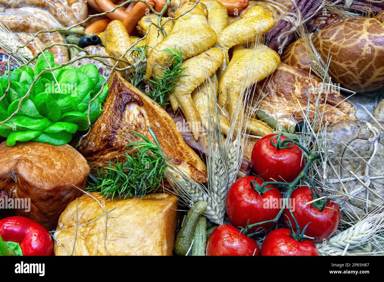 Assorted of delicious deli meats in butcher shop showcase Stock Photo