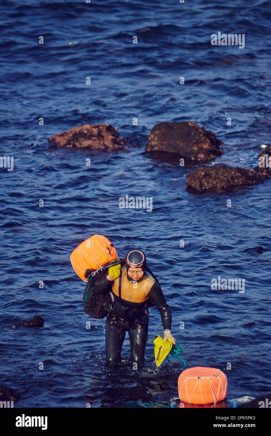 Haenyeo, the female divers in the Jeju island, South Korea Stock Photo