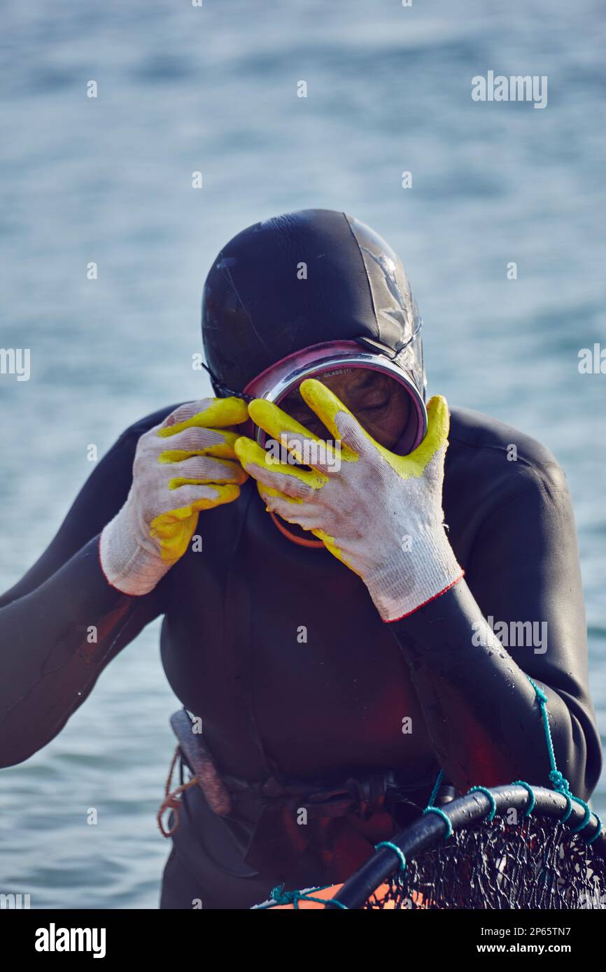 Haenyeo, the female divers in the Jeju island, South Korea Stock Photo