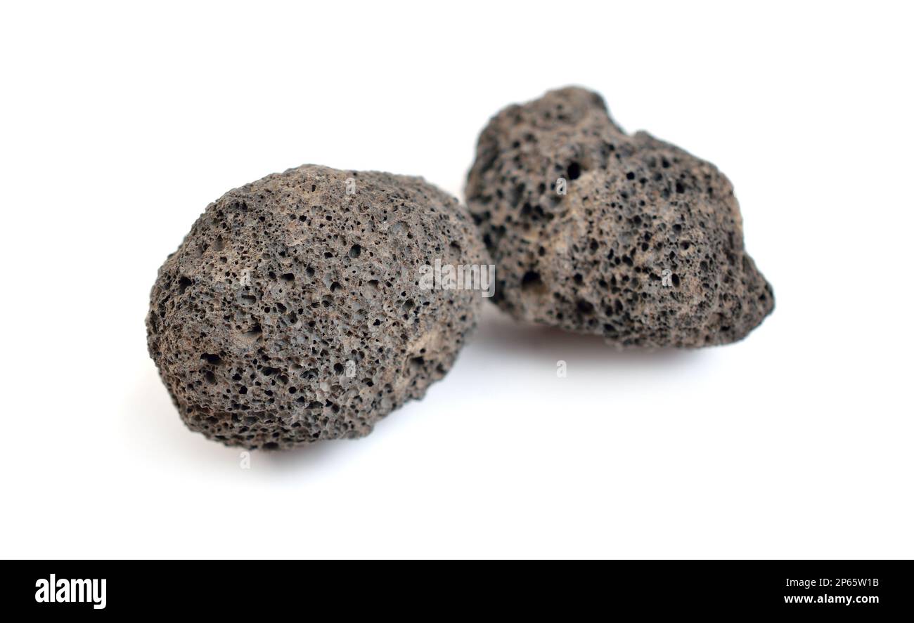 Porous black volcanic rock isolated on white background. Lava stone ...