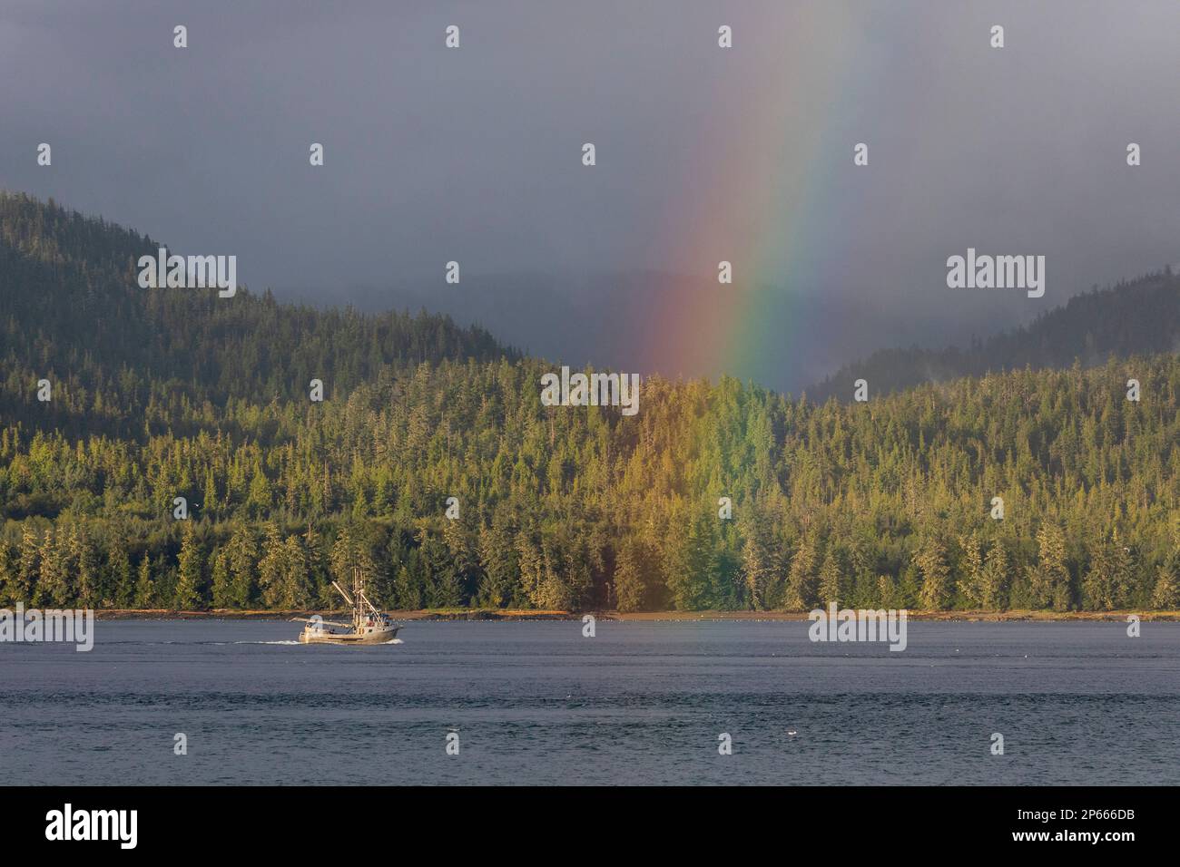 Commercial fishing boat with a rainbow in Behm Canal, Southeast Alaska, United States of America, North America Stock Photo