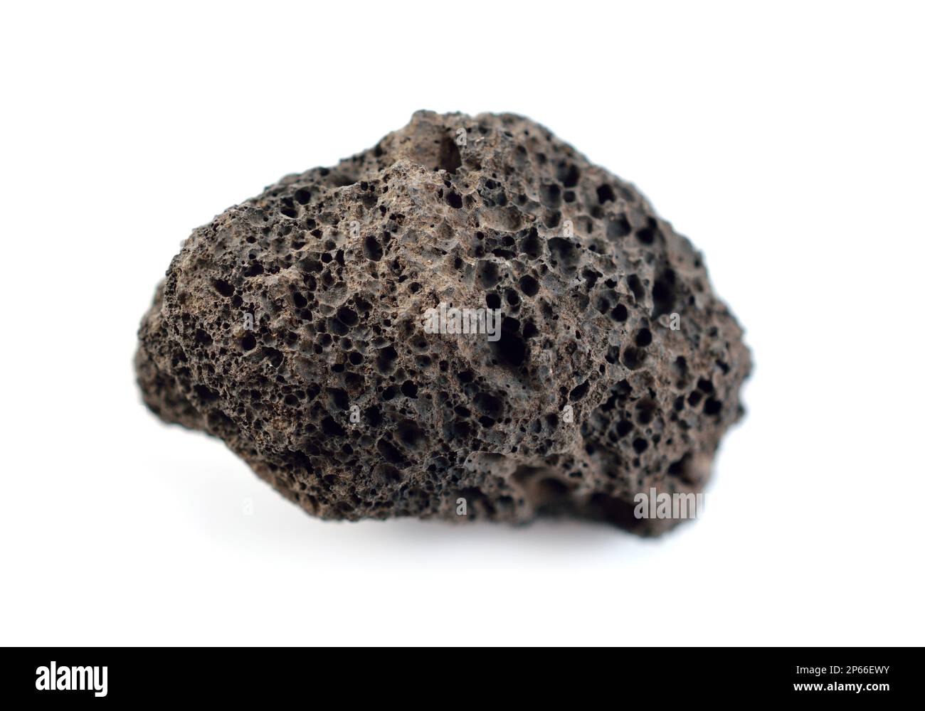 Porous black volcanic rock isolated on white background. Lava stone ...