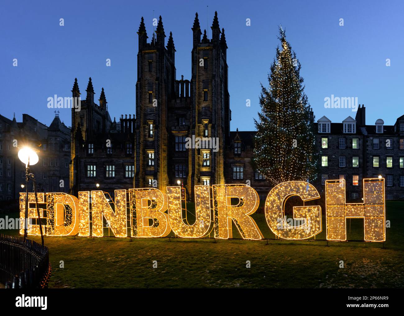Edinburgh Christmas tree and sign in front of the New College, the