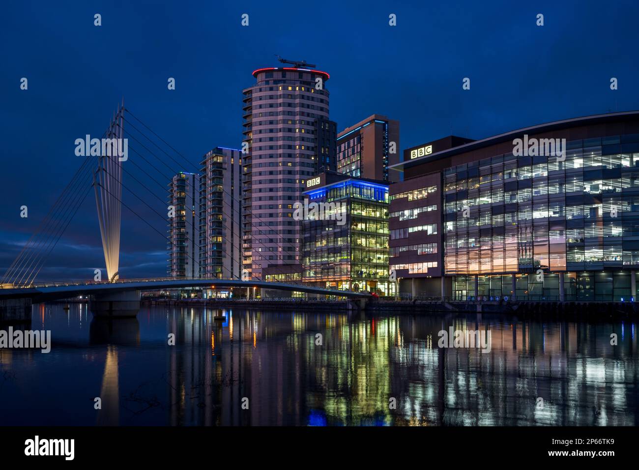 MediaCity and swingbridge at night, Salford Quays, Manchester, England, United Kingdom, Europe Stock Photo