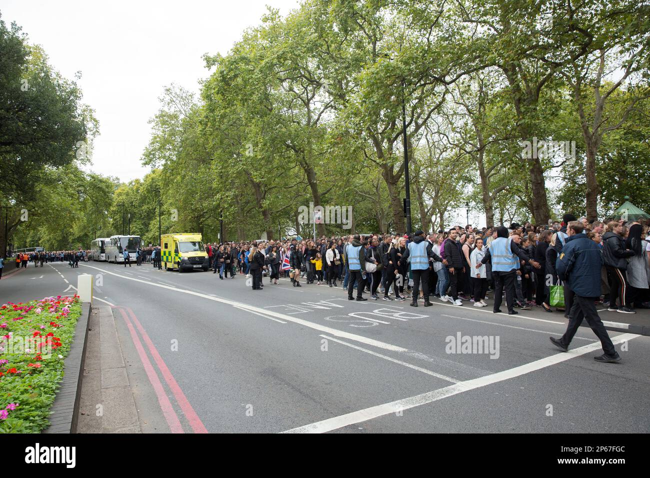 Mourners gather to pay their respects in central London, on the day of