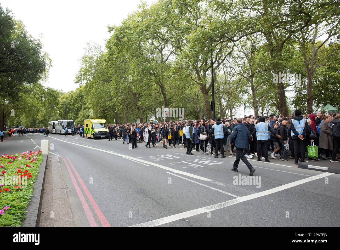 Mourners gather to pay their respects in central London, on the day of her funeral. Stock Photo