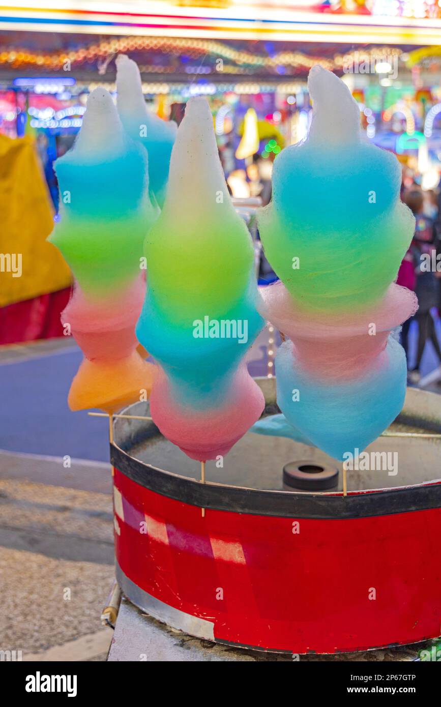 Rainbow Cotton Candy Floss Machine at Fun Fair Carnival Stock Photo