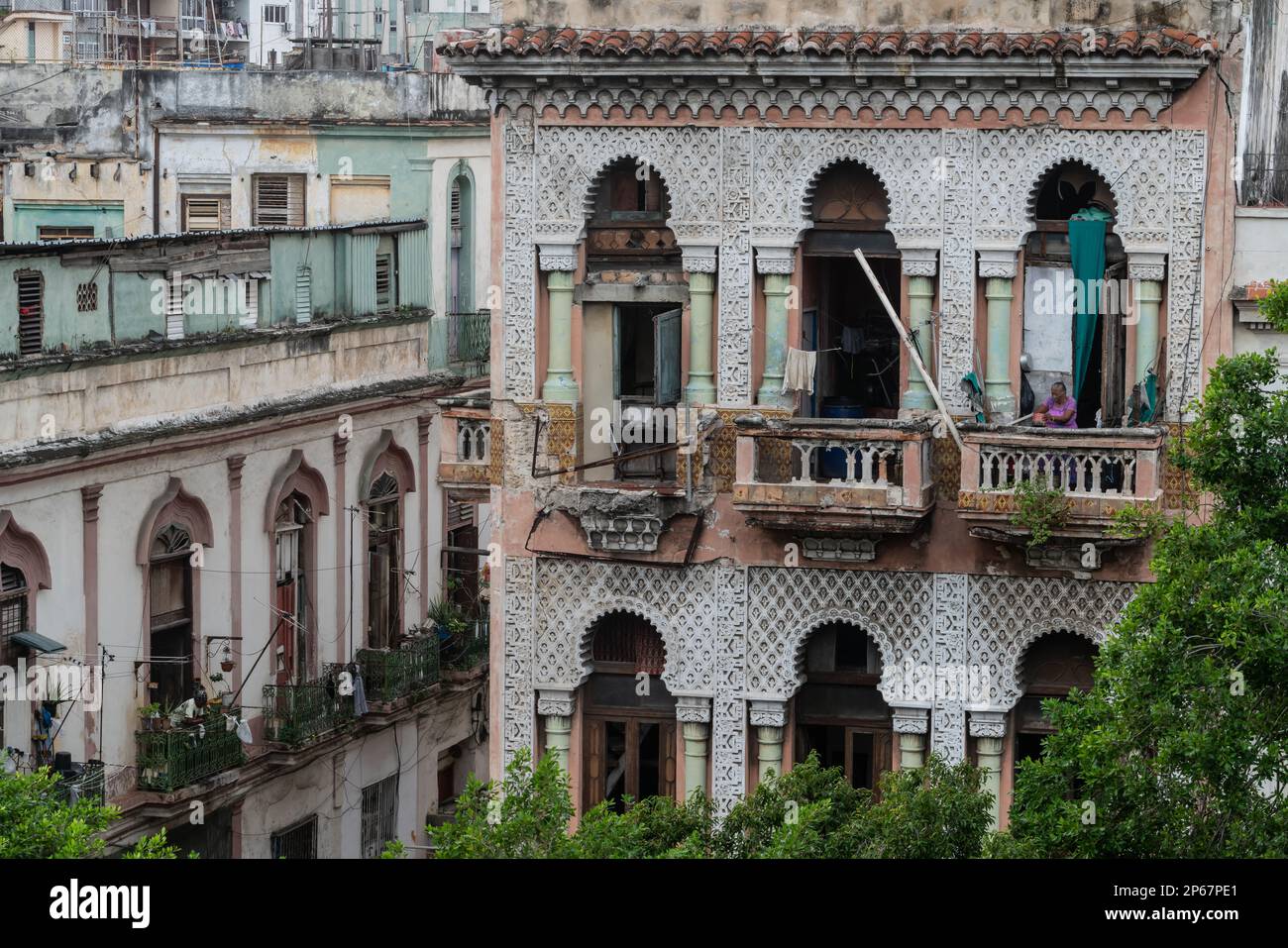 Cubans at their windows, Moorish architecture, in Old Havana, Cuba, West Indies, Caribbean, Central America Stock Photo