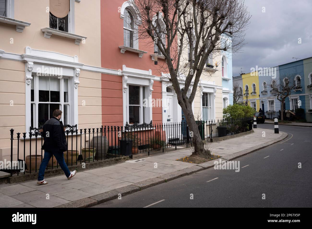 Painted period properties in Kelly Street NWI, in the north London borough of Camden, on 6th March 2023, in London, England. Stock Photo