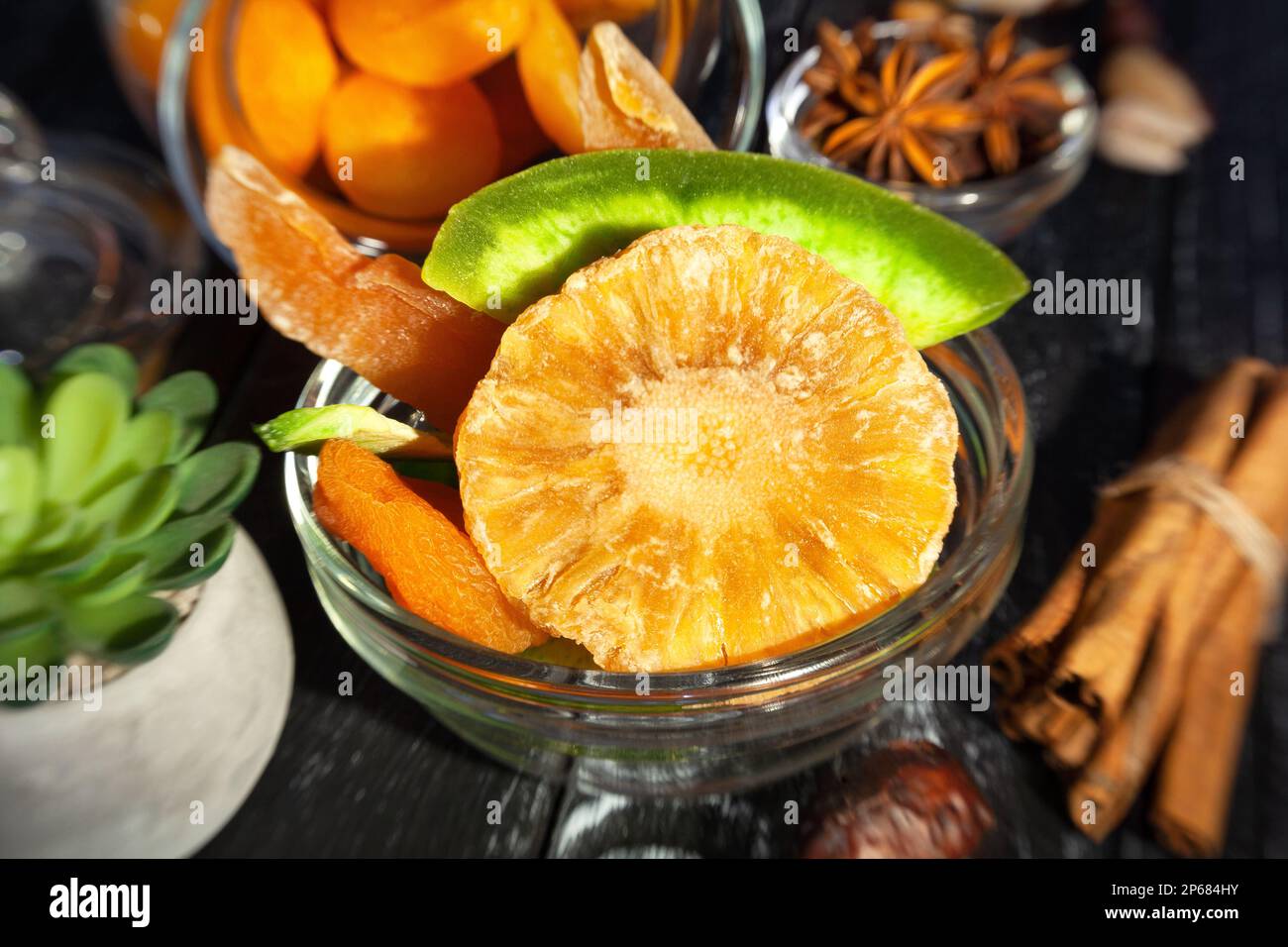 dried pineapple on wood background Stock Photo