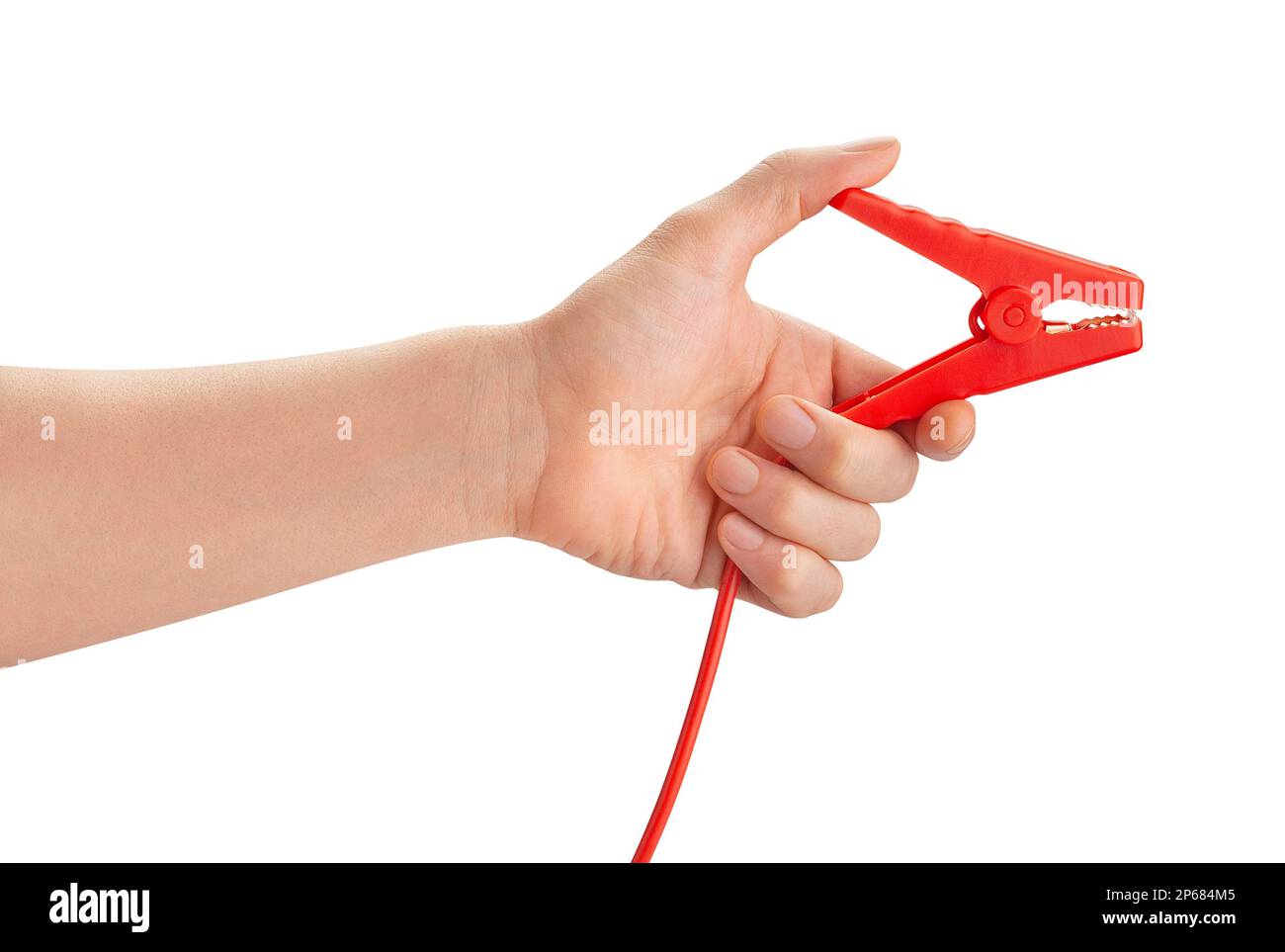 engine jump starter clamp in hand path isolated on white Stock Photo
