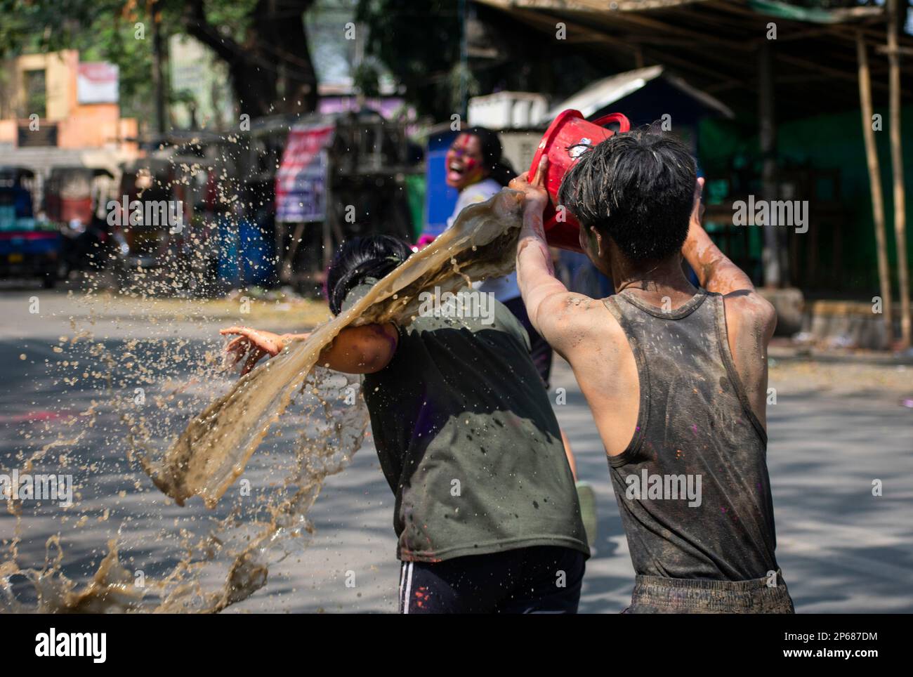 Spring In Assam Reveller smear mud to celebrate Holi, the Hindu spring festival of ...