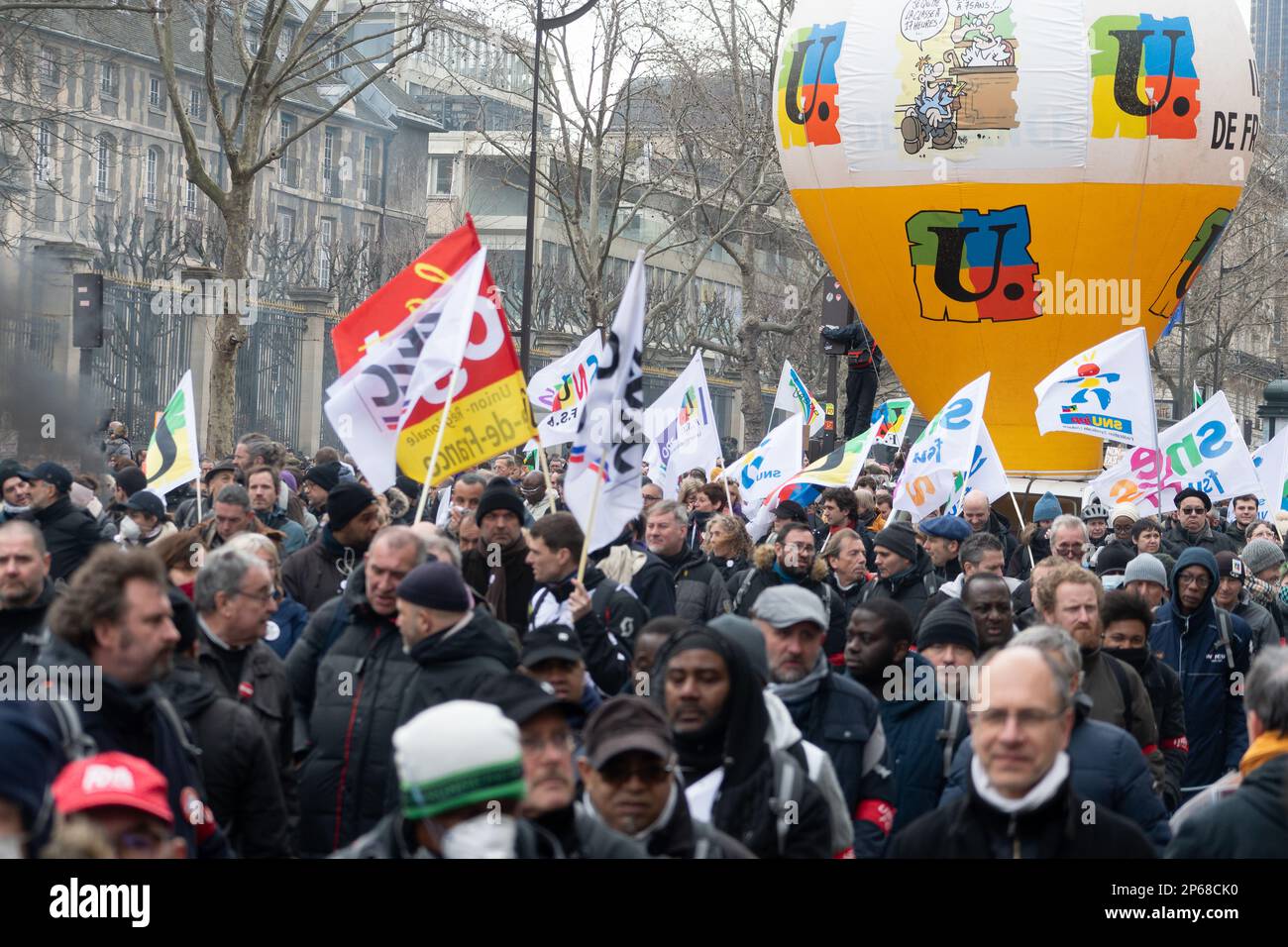 Paris, France, 7th March, 2023. Strike and people protests with flags against pension reform - Jacques Julien/Alamy Live News Stock Photo