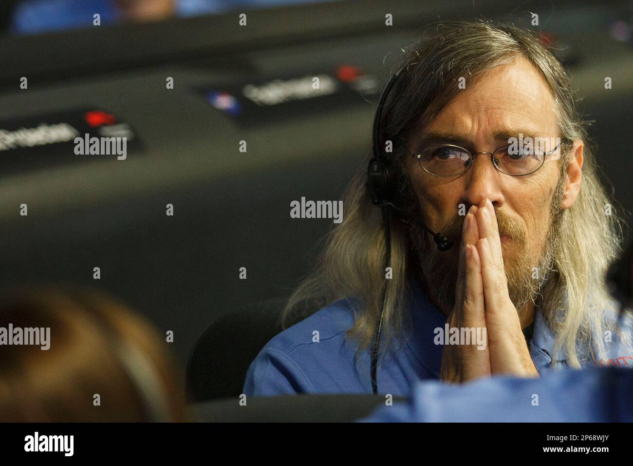 Steve Collins waits during the "Seven Minutes of Terror" as the rover approaches the surface of