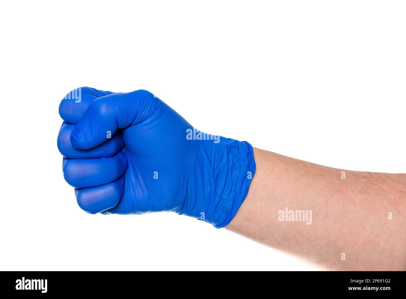 Crop anonymous hand of person in latex blue glove with clenched fist against white background Stock Photo