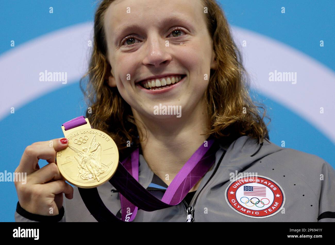 United States' Katie Ledecky Poses On The Podium With Her Gold Medal In ...