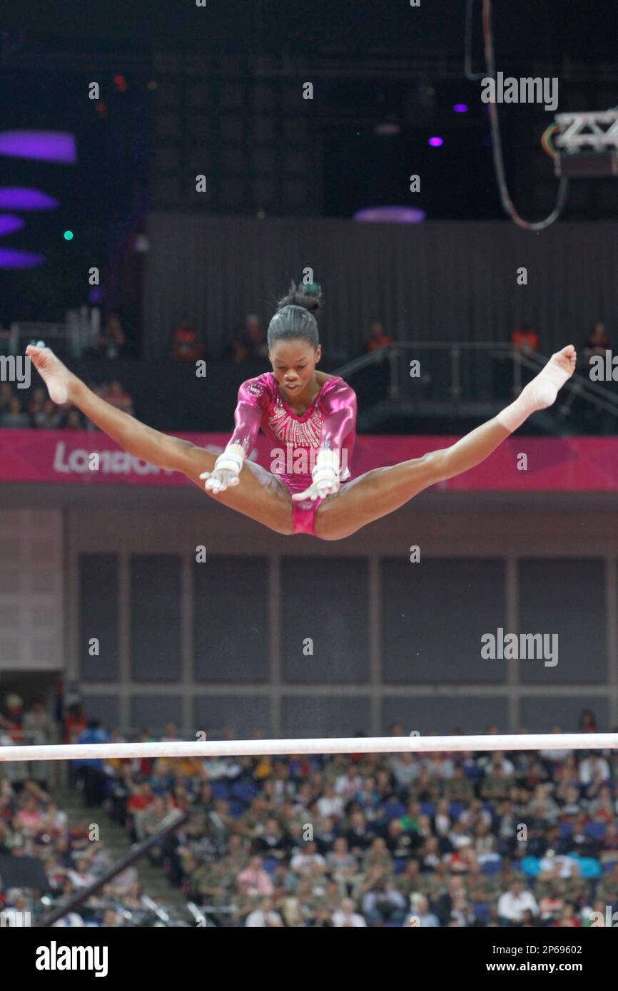 United States gymnast Gabrielle Douglas performs on the uneven bars in