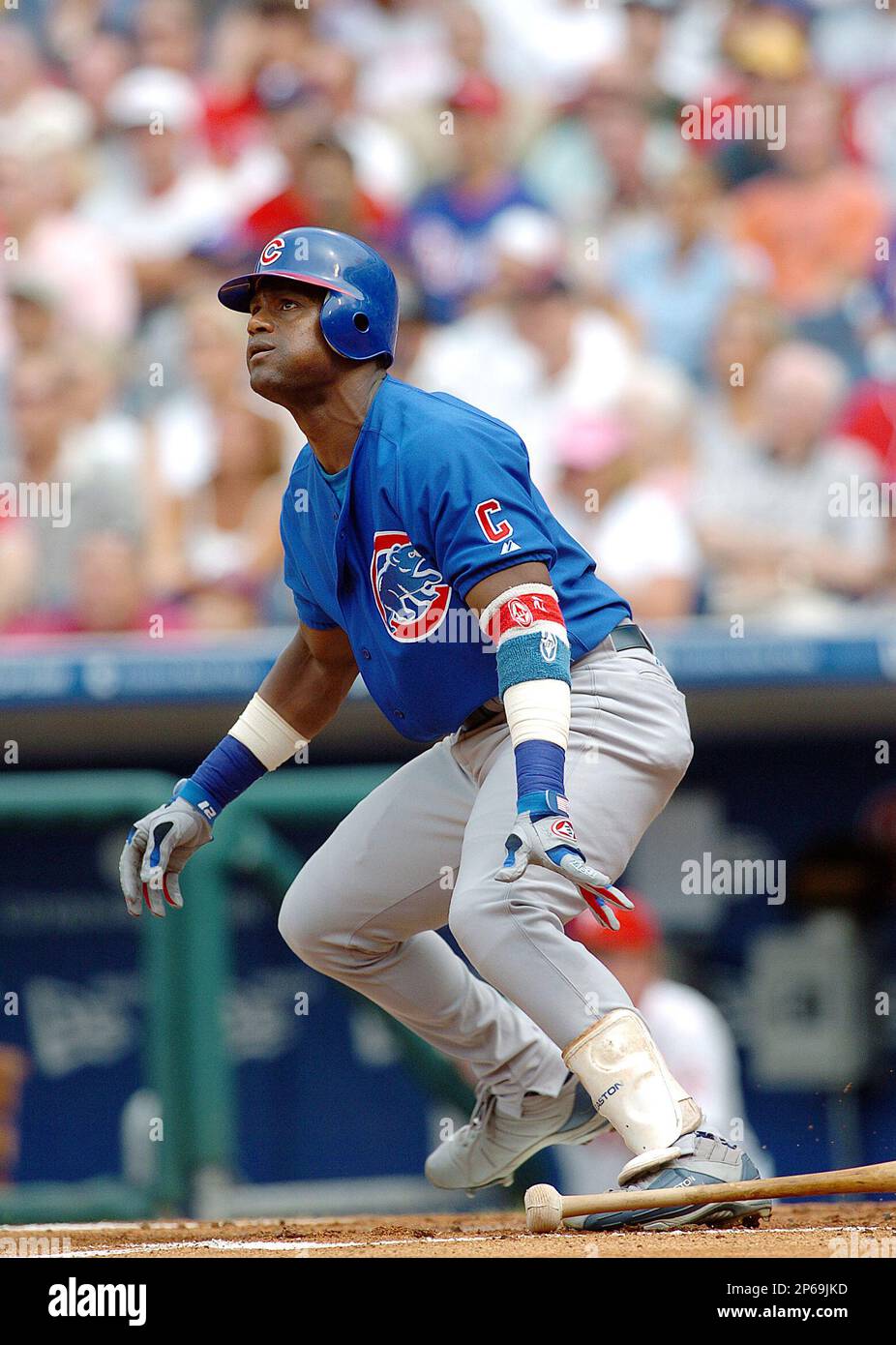 Chicago Cubs slugger Sammy Sosa hits a solo home run in the eighth