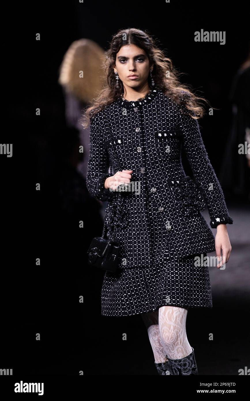 A model wears a creation as part of the Chanel Fall/Winter 20232024