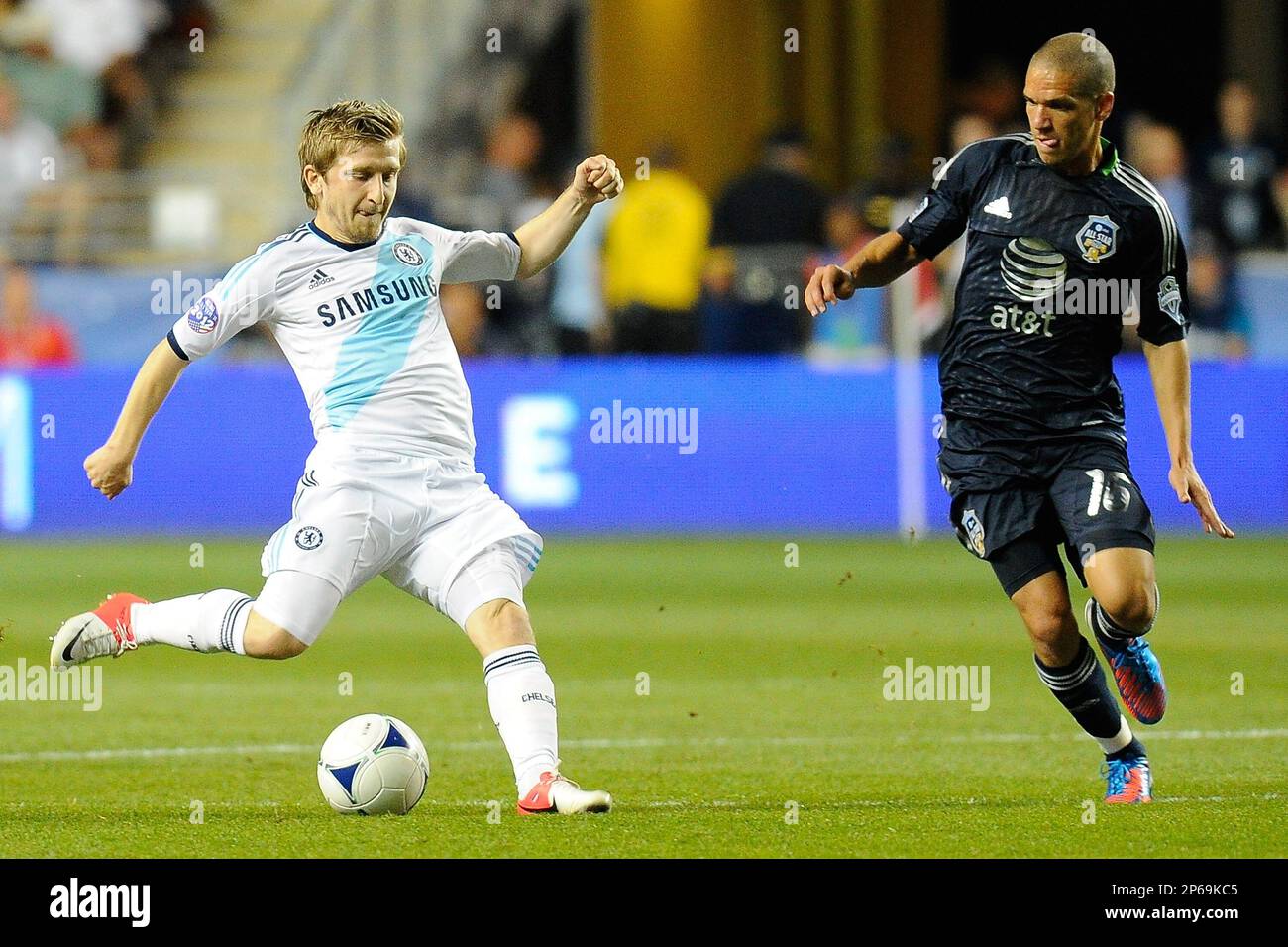 July 25, 2012: Chelsea FC midfielder Marko Marin #21 prepares to pass the  ball in front of MLS All-Stars midfielder Osvaldo Alonso #16 during the  first half of the 2012 AT&T MLS