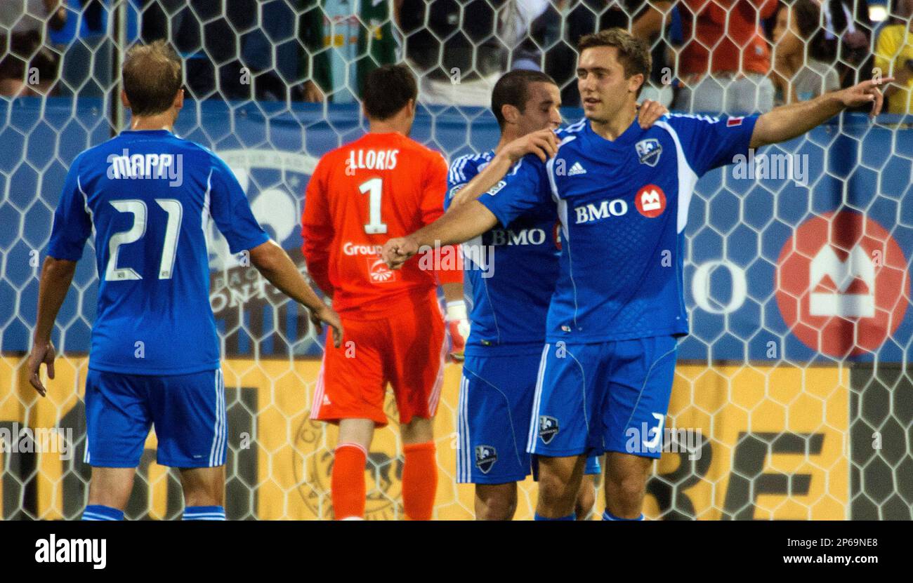 Montreal Impact's Karl Ouimette celebrates his goal against Olympique  Lyonnais during the first half of an international friendly soccer match,  Tuesday, July 24, 2012, in Montreal. (AP Photo/The Canadian Press, Peter  McCabe