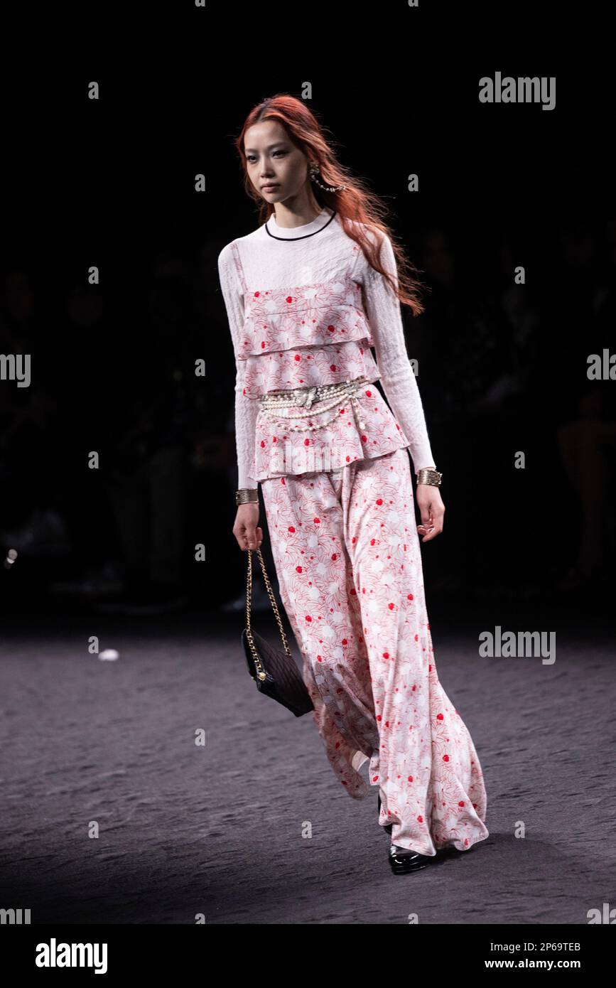 A model wears a creation as part of the Chanel Fall/Winter 2023-2024 ready -to-wear collection presented Tuesday, March 7, 2023 in Paris. (Vianney Le  Caer/Invision/AP Stock Photo - Alamy
