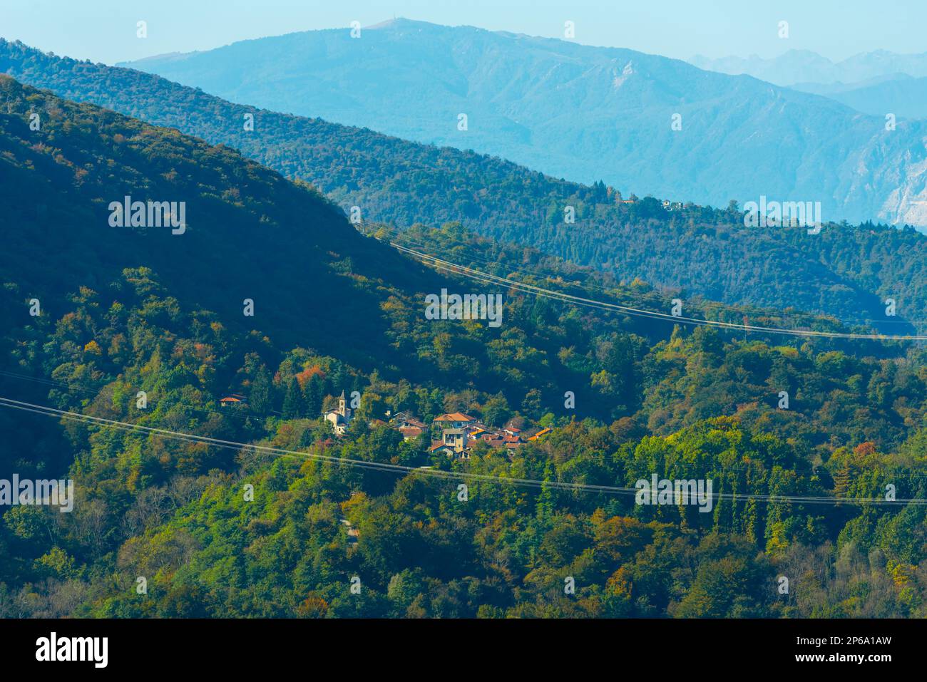 Small Mountain Village in Province of Varese in a Sunny Summer Day in Lombardy, Italy. Stock Photo