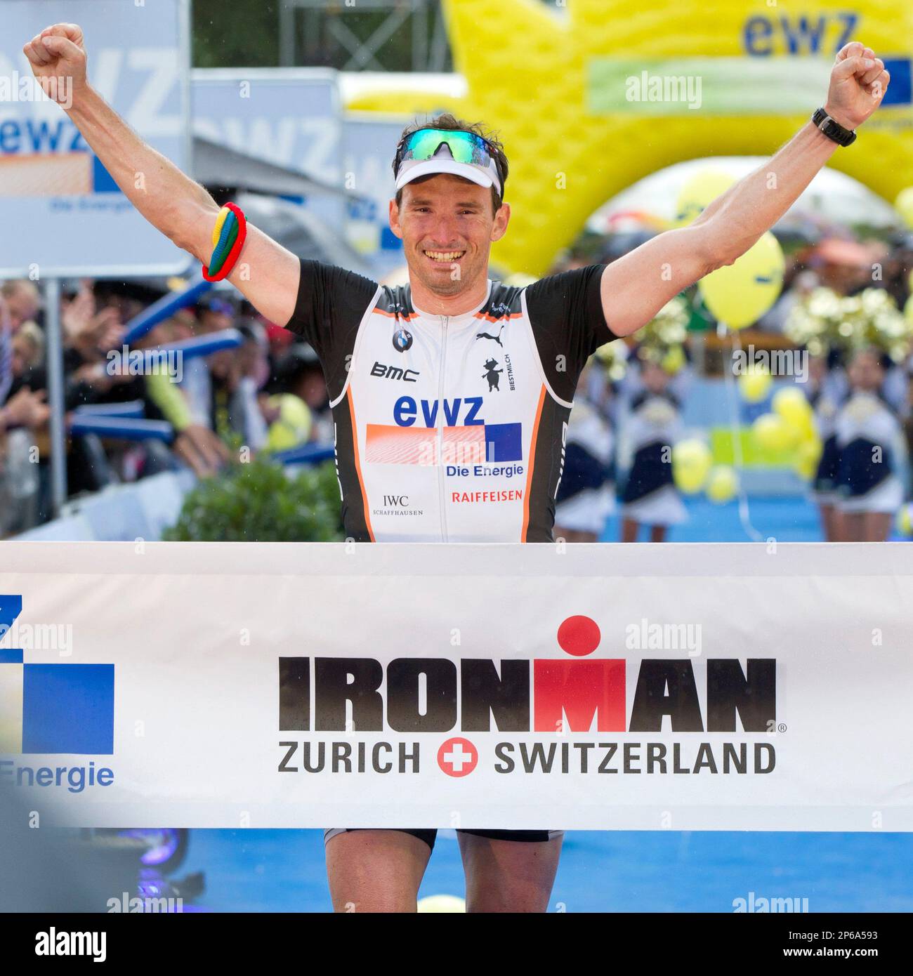 Switzerland's Ronnie Schildknecht crosses the finish line to win the ...