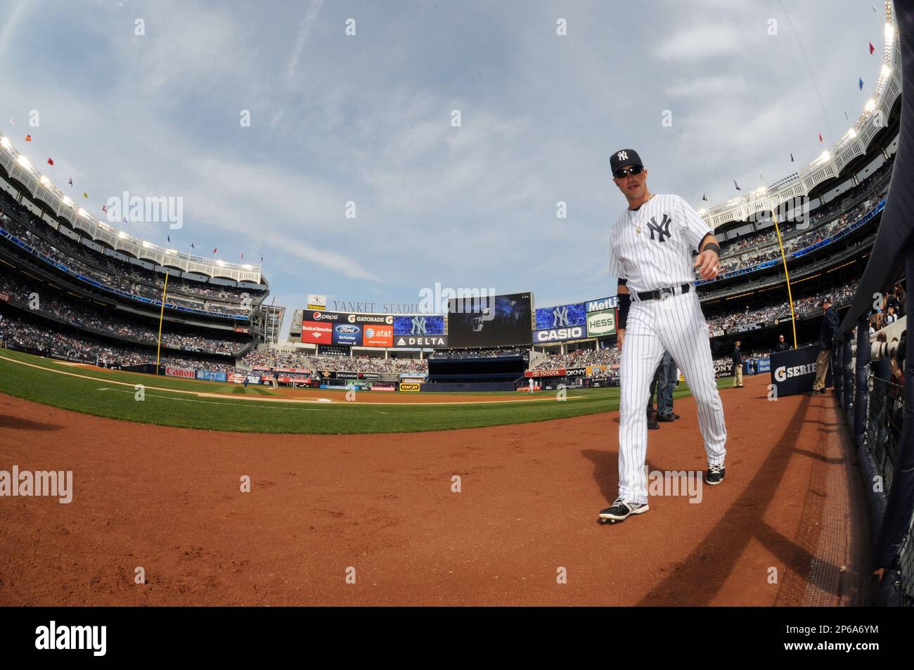 New York Yankees Outfielder Nick Swisher (#33) heads to first. The