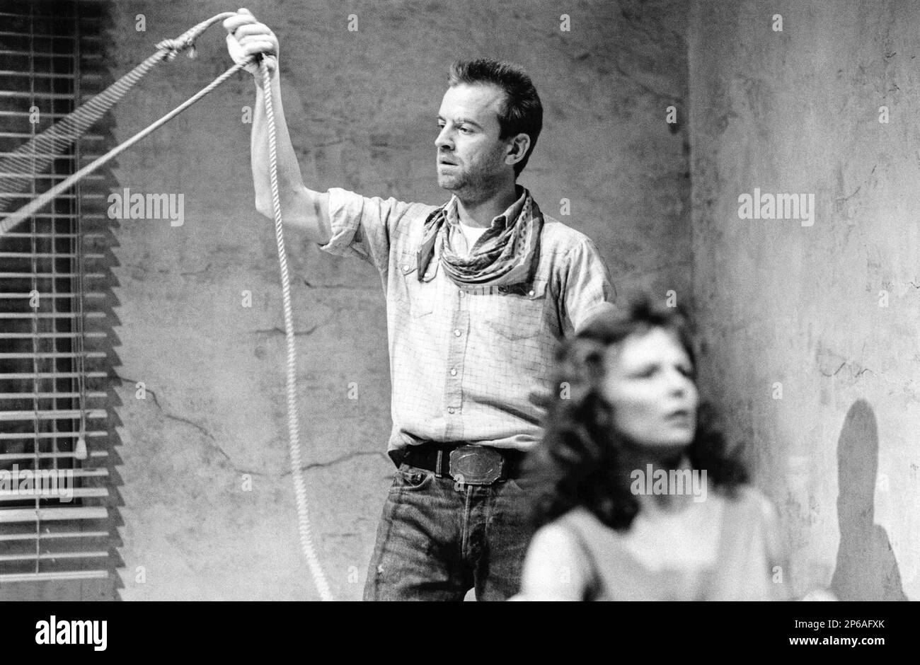 Ian Charleson (Eddie), Julie Walters (May) in FOOL FOR LOVE  by Sam Shepard at the Cottesloe Theatre, National Theatre (NT), London SE1  04/10/1984 design: Alison Chitty  lighting: Stephen Wentworth  director: Peter Gill Stock Photo