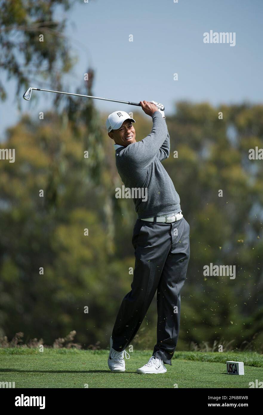 Tiger Woods hits off the second tee during the first round of the U.S