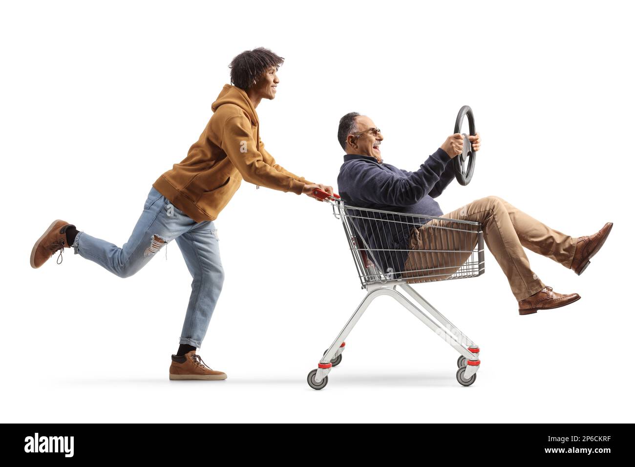 African american guy pushing a mature man inside a shopping cart