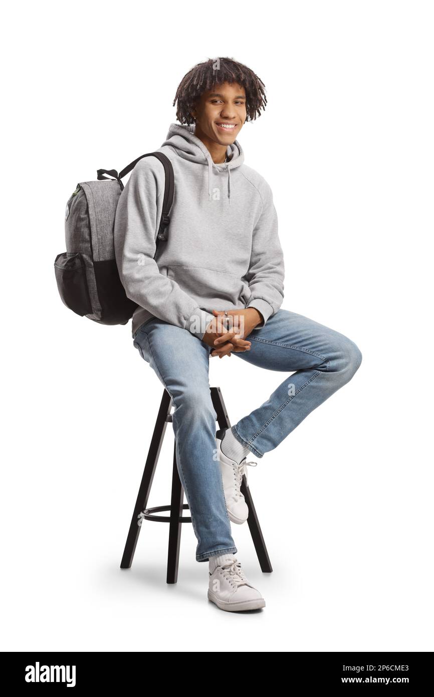 African american male student with a backpack sitting on a chair ...