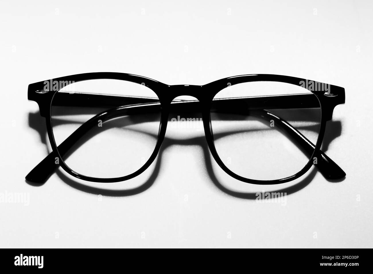 Black glasses on isolated white background black and white Stock Photo