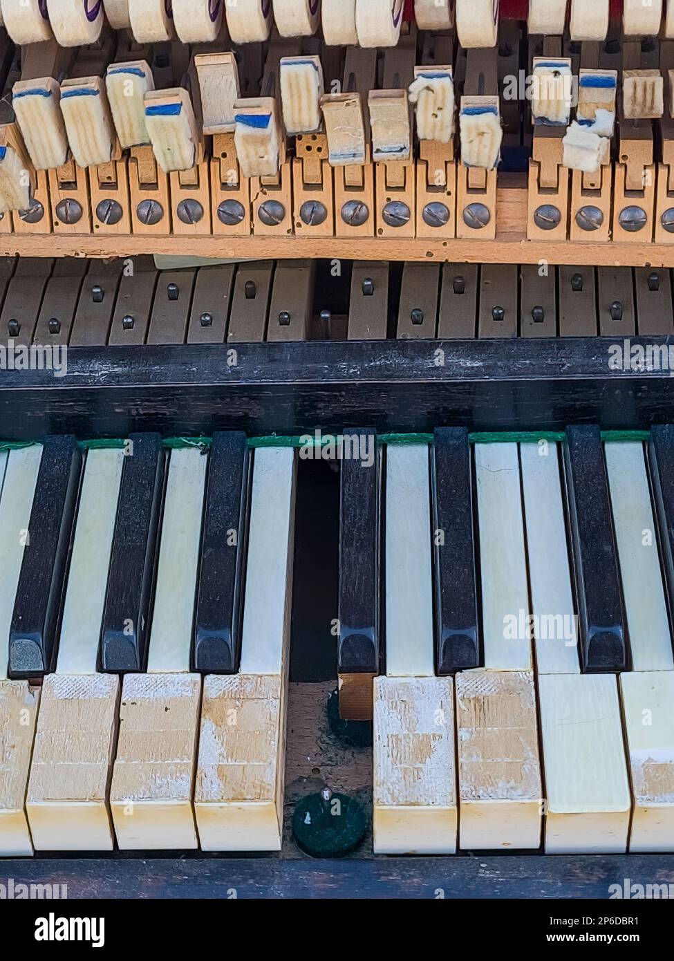 Detail of the broken keys of an old piano Stock Photo