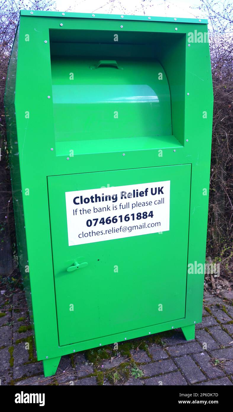 A clothing donation box with a sign from Clothing Relief UK on a street